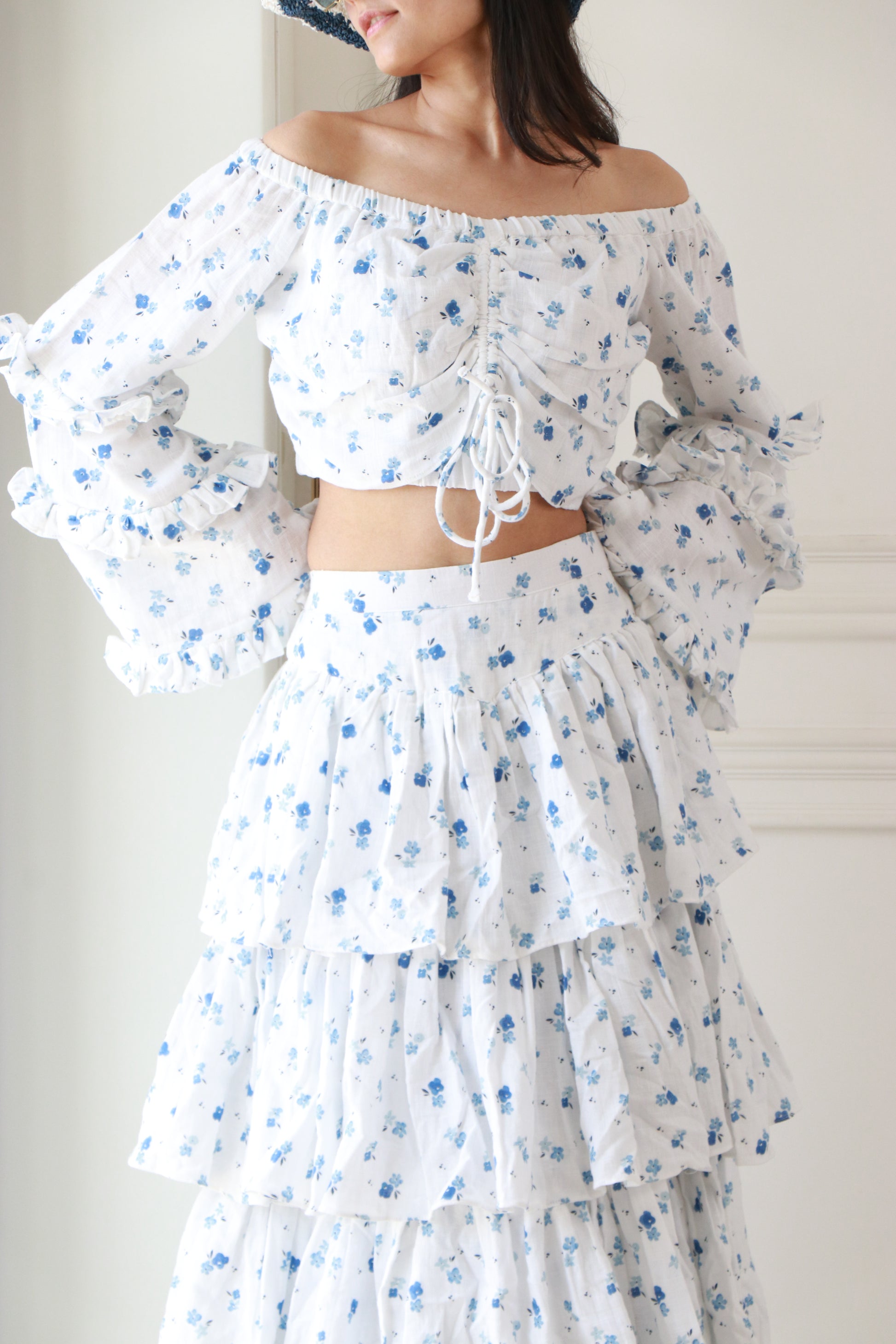 White and blue floral semi-linen co-ord set with elasticated crop top and tiered maxi skirt